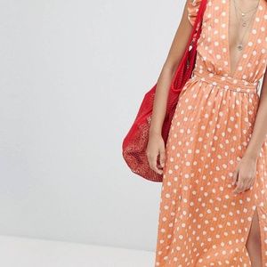 Peach Sleeveless polka dot midi dress